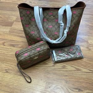 Brand NWT coach city tote with lips print! Never used!